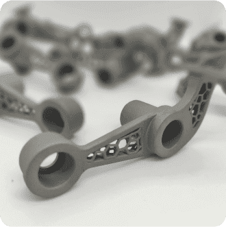 титан 3Д друк розробка виготовлення специфічне кріплення пустотіла металева трубчаста каркасна деталь армована комірчастою структурою 3д деталь для мотоцикла україна мотоцикл друк титаном українська медицина